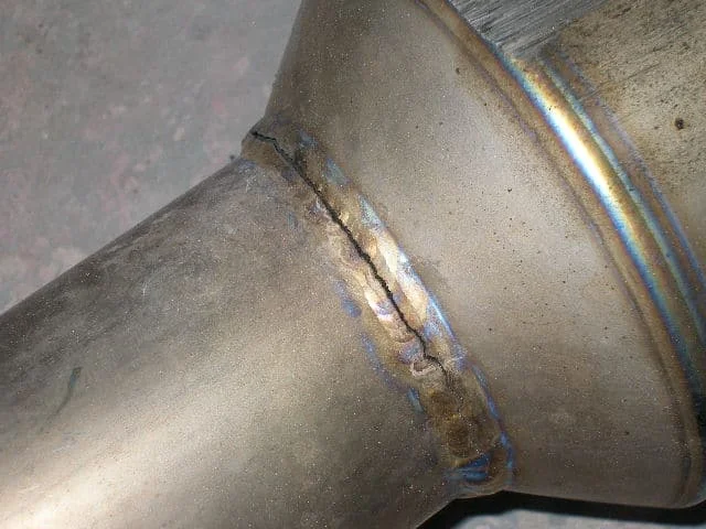 A cracked exhaust weld.