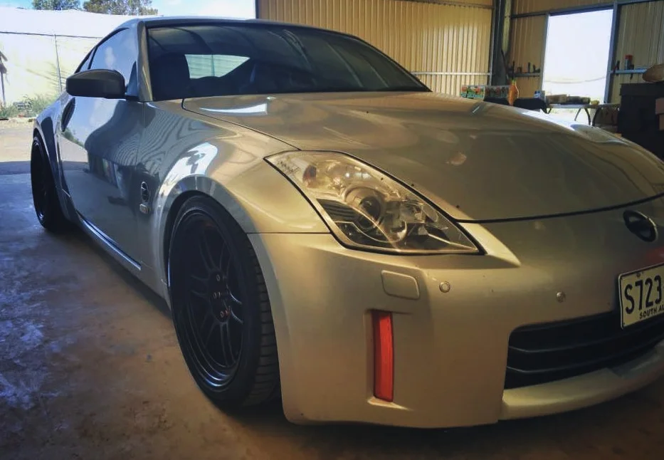 Nissan 350z with 18x9.5 +12mm Enkei RPF1 rims