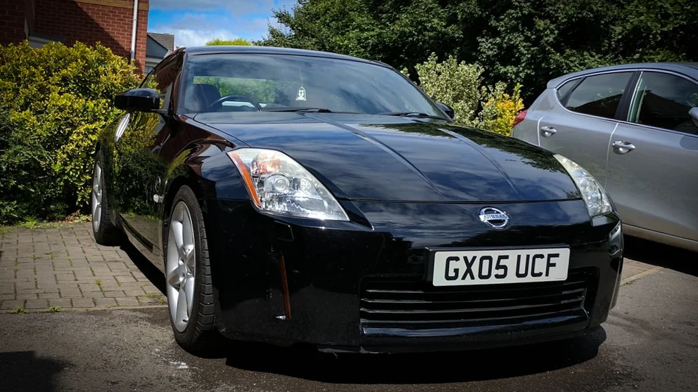 Nissan 350z with OEM wheels after installing spacers