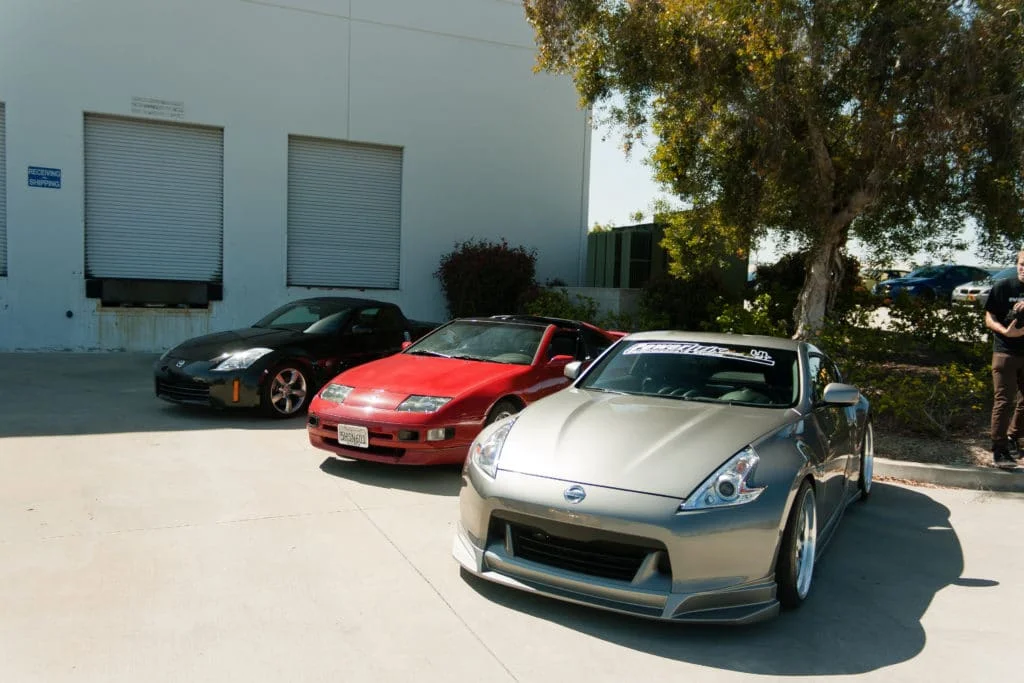 Nissan 350z and 370z next to their ancestor, the Nissan 300zx