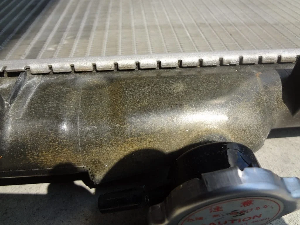 Discoloration of a MX-5 Miata radiator's end tank