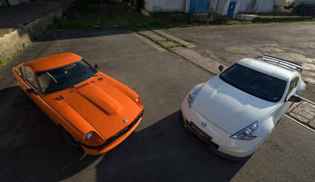 Z car history: a Datsun 240z next to a Nissan 370z