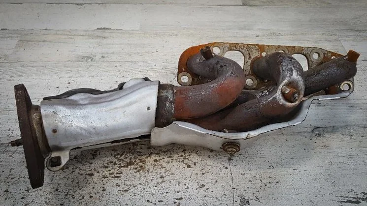 OEM Nissan 370z exhaust manifold