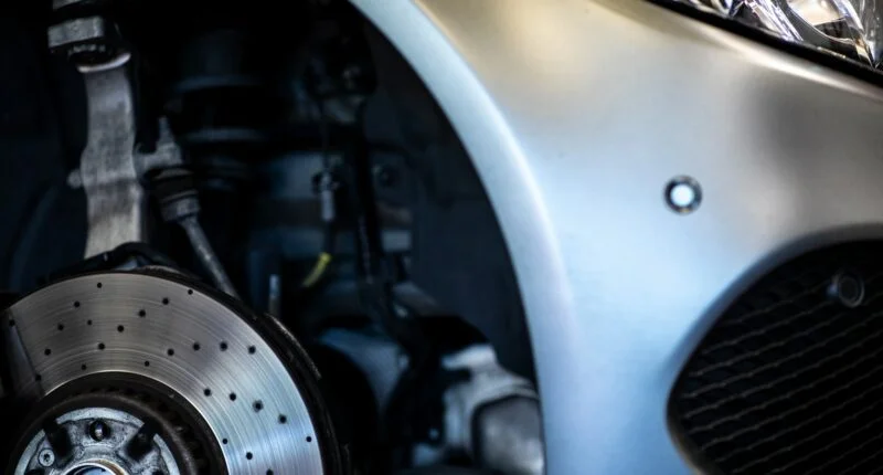 Adjusting wheel caster angle