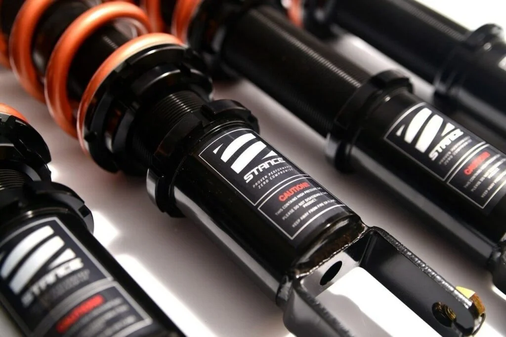 Coil over shock absorber system