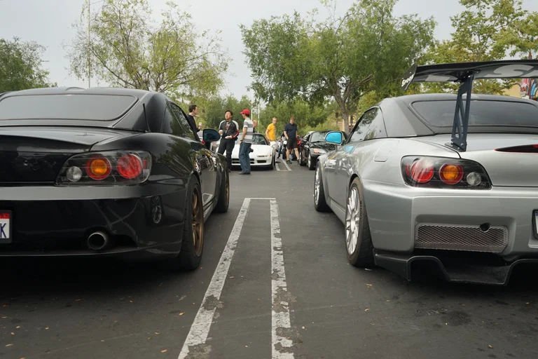 Honda S2000s with aftermarket wheels and bodywork