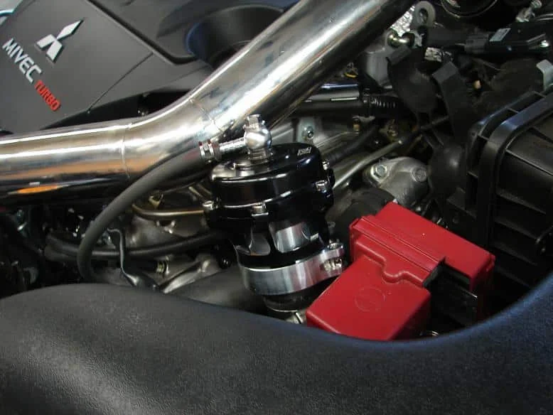 A bolt on-on turbo blow off valve like this one is well worth the money