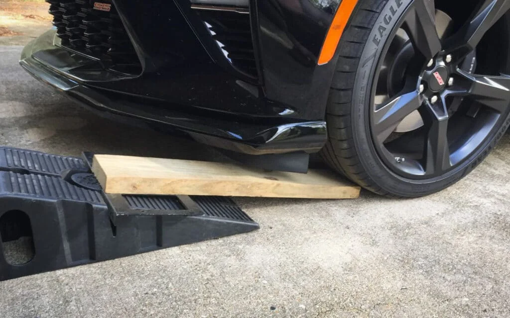 Don't use ghetto solutions like blocks of wood, choose the right ramps from the beginning
