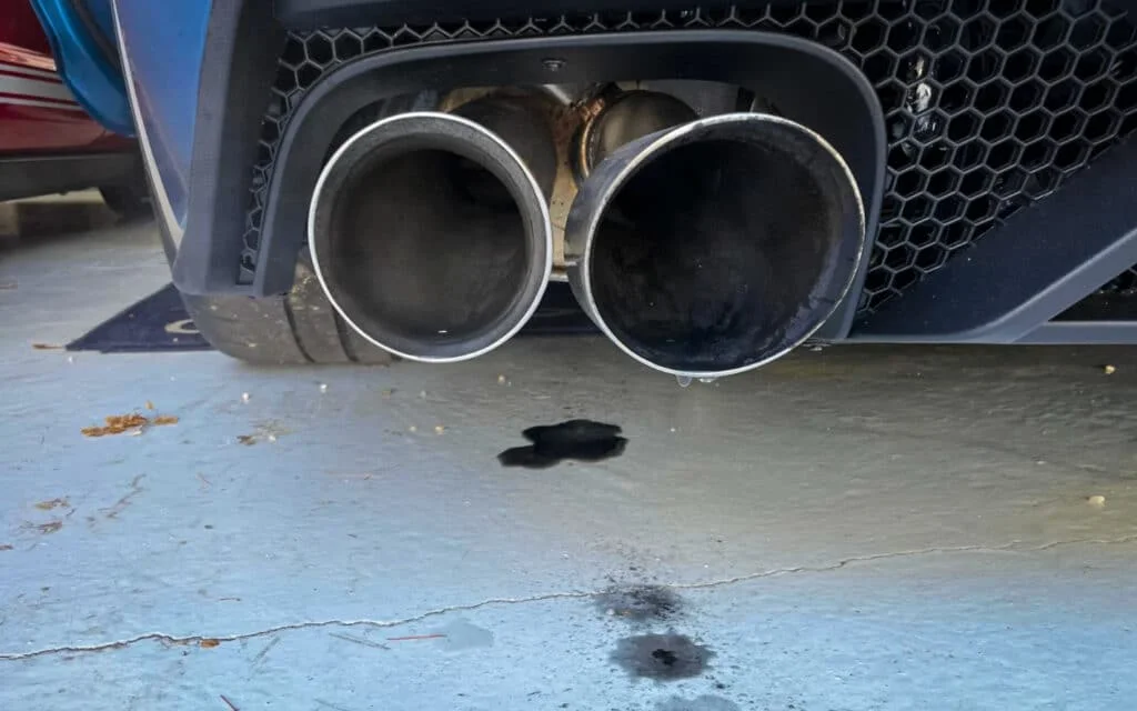 Condensation on garage floor from a car exhaust
