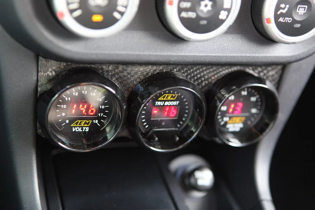 Agency Power's carbon fiber under dash gauge pod