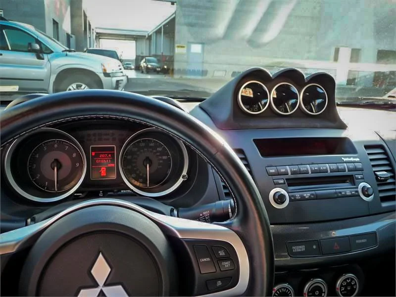 GlowShift Triple 52mm dash mount gauge pod for Mitsubishi Lancer Evo X