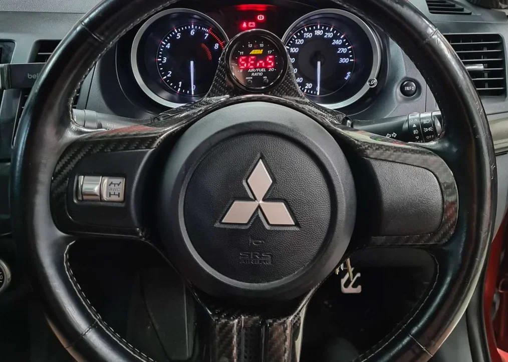 Rexpeed R149 single gauge steering wheel pod on Mitsubishi Lancer Evolution X CZ4A