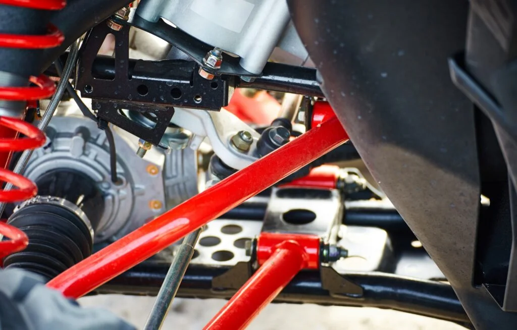Race cars have a large number of suspension component mounting points to allow for a wide range of adjustment