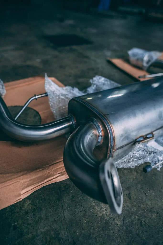 Aftermarket car exhaust system waiting to be installed
