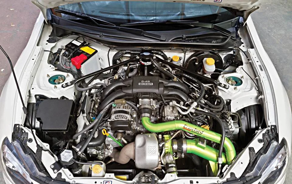 Crawford turbo kit with green accents installed on a Subaru BRZ