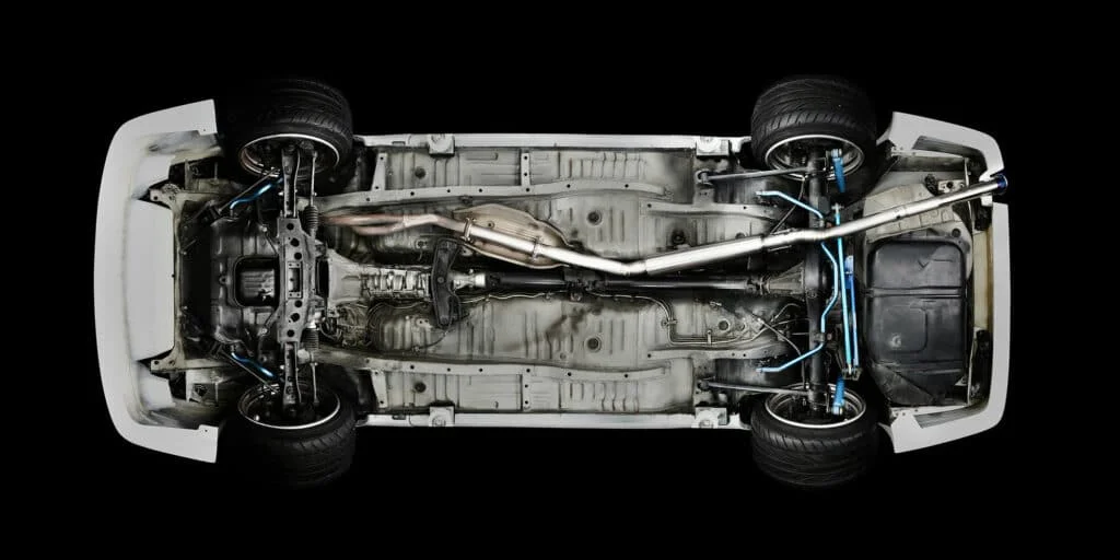 Car undercarriage illustration with straight exhaust
