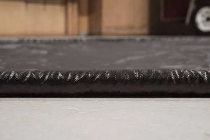 Garage car containment mat close up