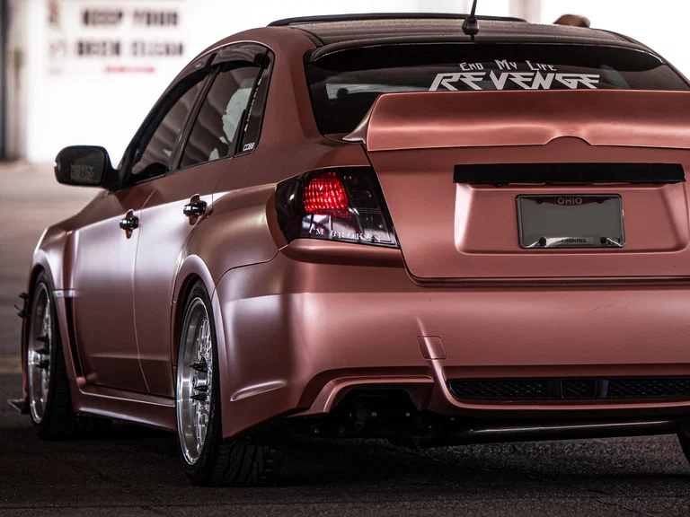 Subaru WRX with a matte rose wrap