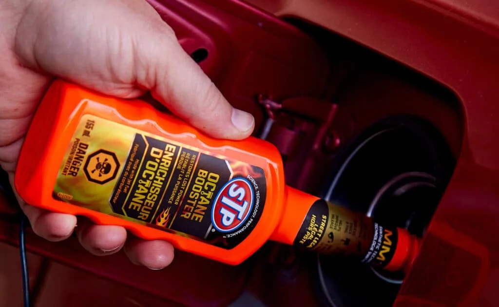 Using STP octane booster additive in a fuel tank
