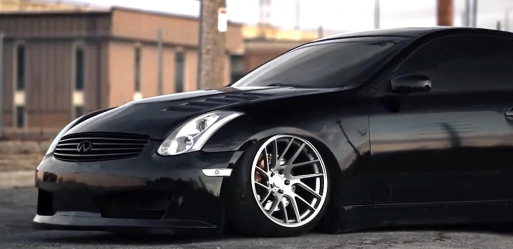Stanced Infiniti G35 on silver Artisa Elder rims