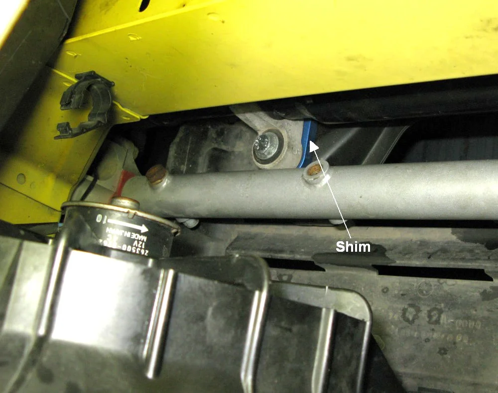 Using a shim to correct bump steer