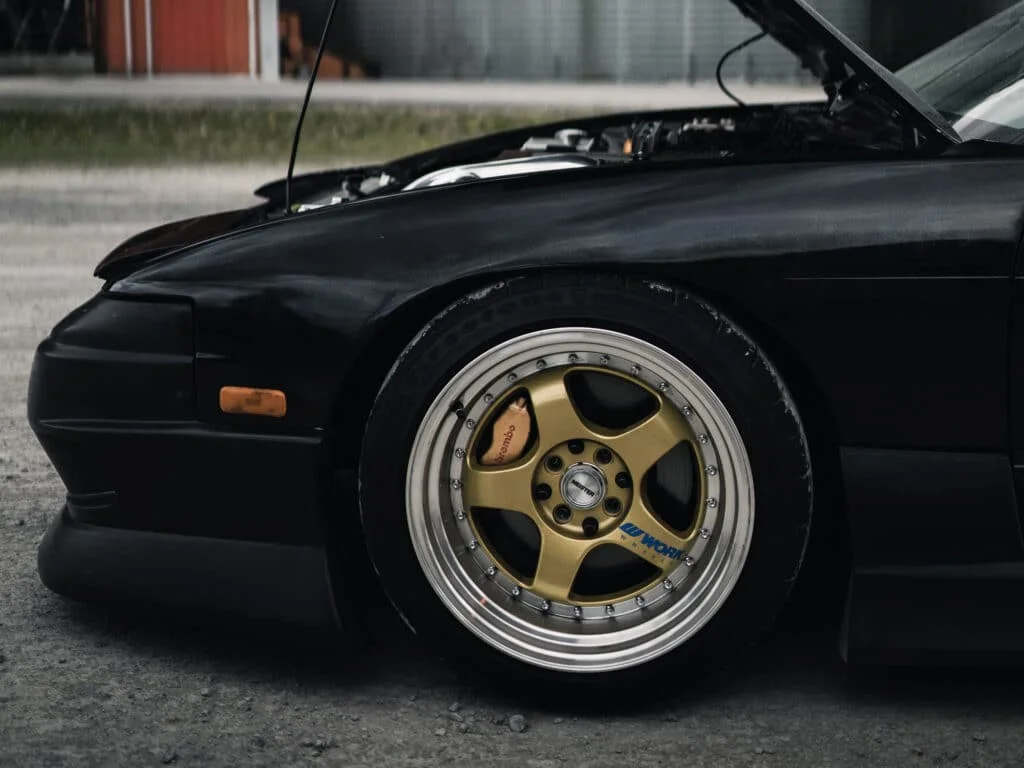 Black 240sx with gold Work rims