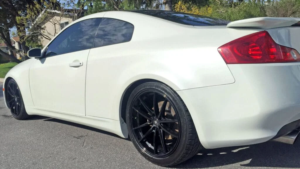 White G35 coupe on black Konig Oversteer rims