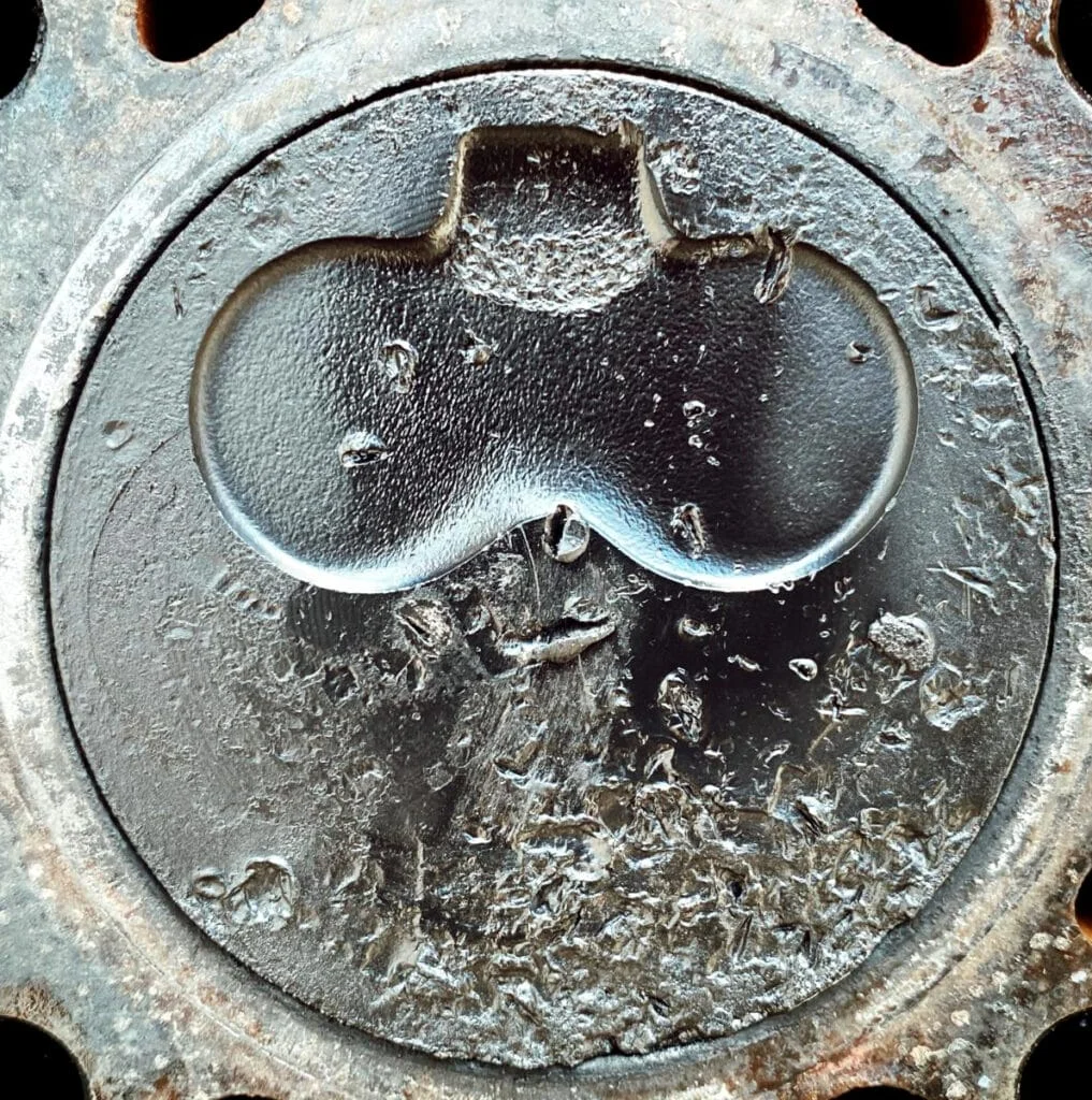 A damaged piston head