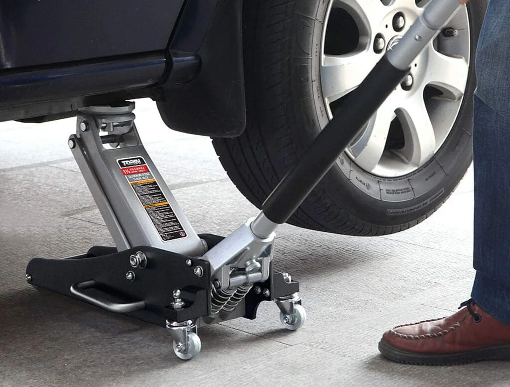 High lift range floor jack