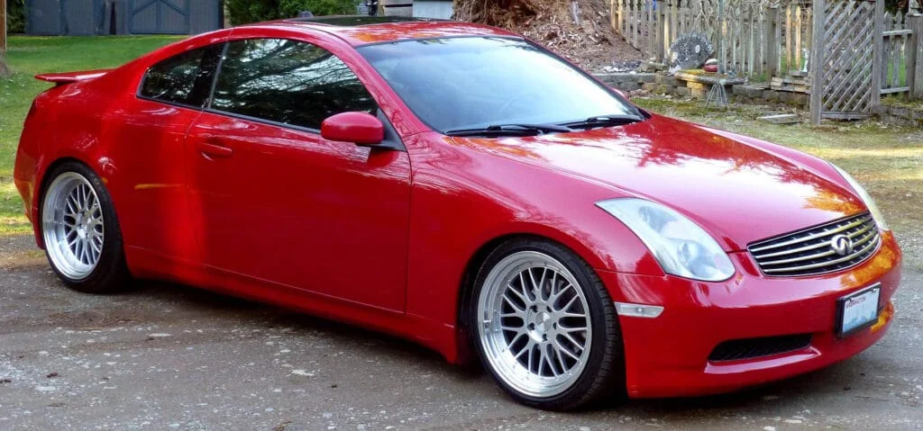 Red G35 coupe with silver VarrsToen ES1 wheels