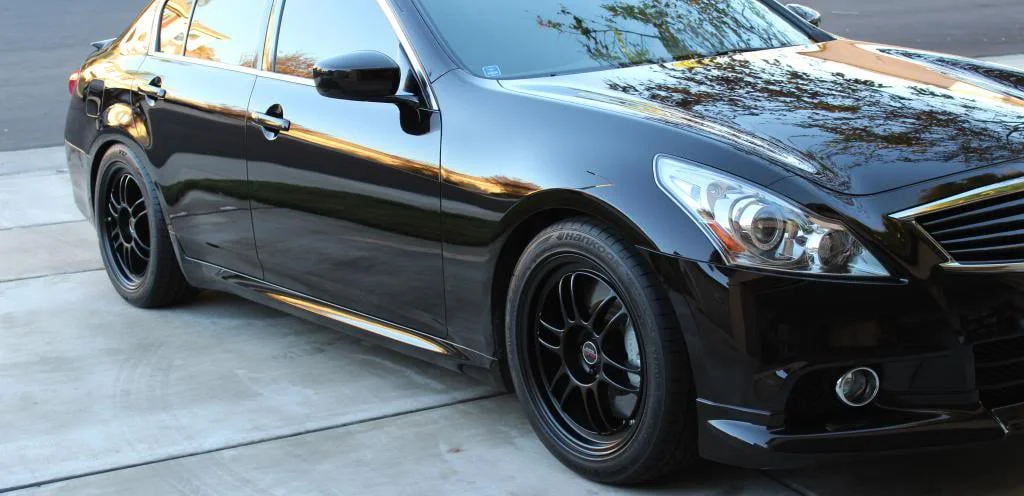 Infiniti G37 sedan on black Enkei RPF1 rims