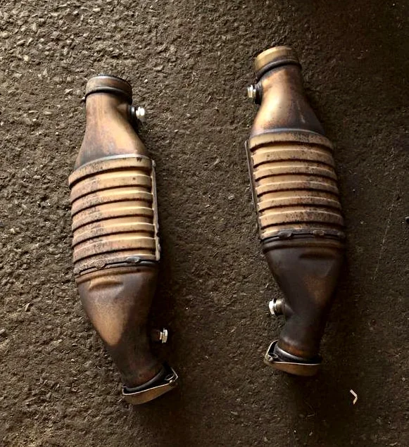 Old rusted catalytic converters