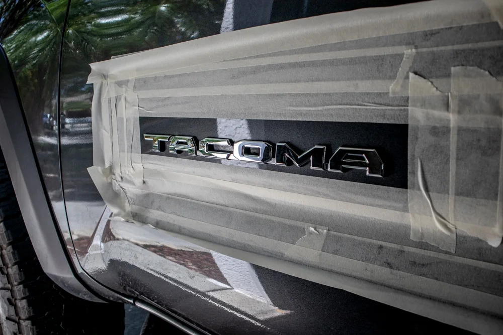 Chrome Tacoma emblem with masking tape