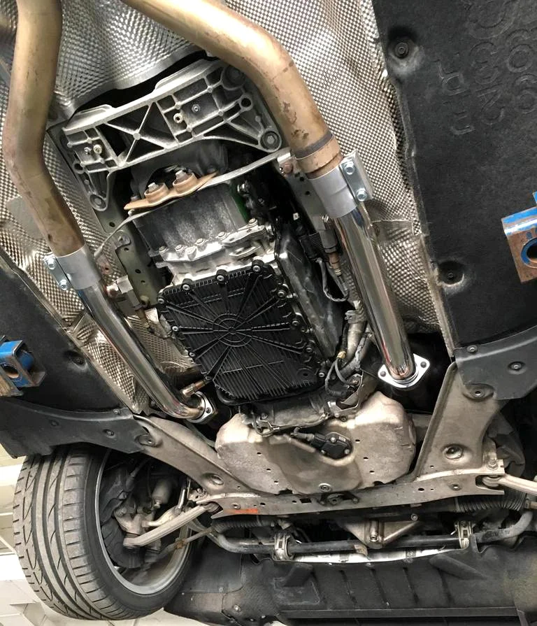 Underside of a car with test pipes installed