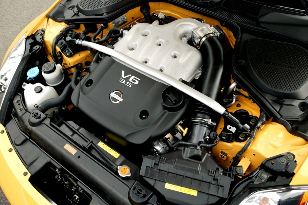 Nissan VQ35DE engine under hood view 