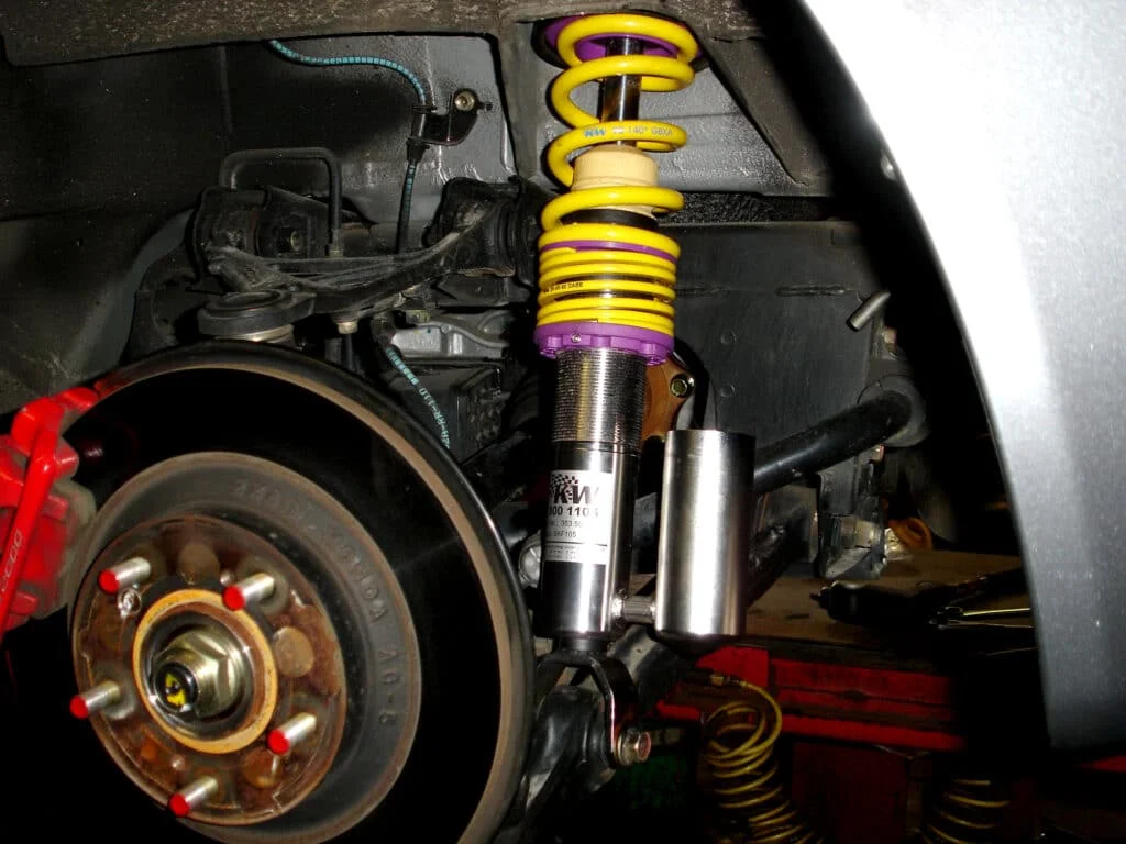 KW coilovers spring height adjustment.