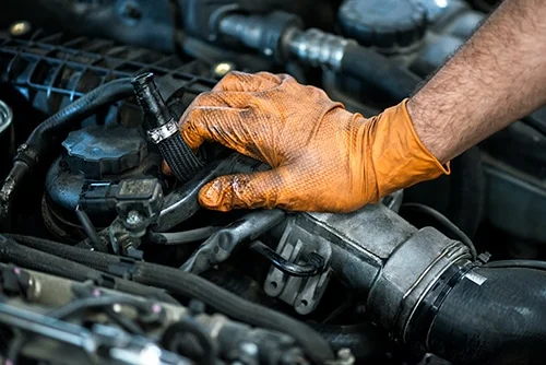 Mechanic wearing work gloves