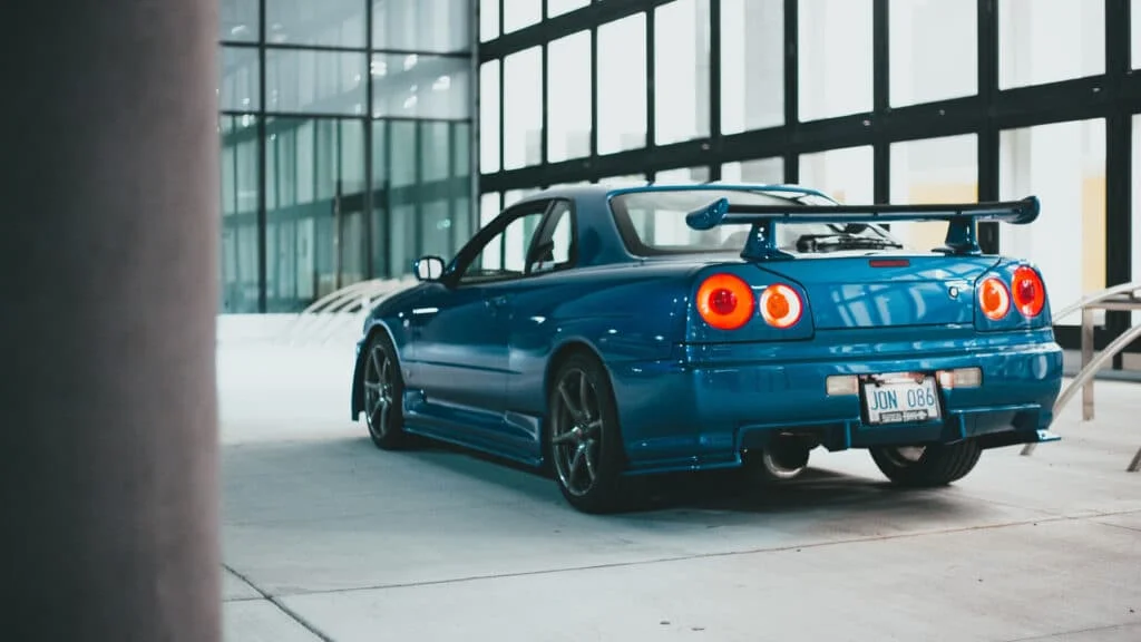 A blue R34 Skyline GT-R
