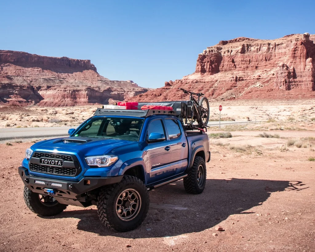 Roof rack equipped Tacoma hauling mountain bikes
