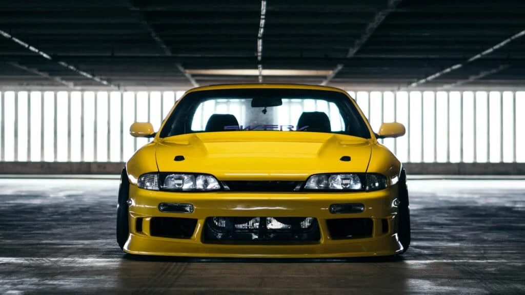 Slammed yellow R33 Skyline