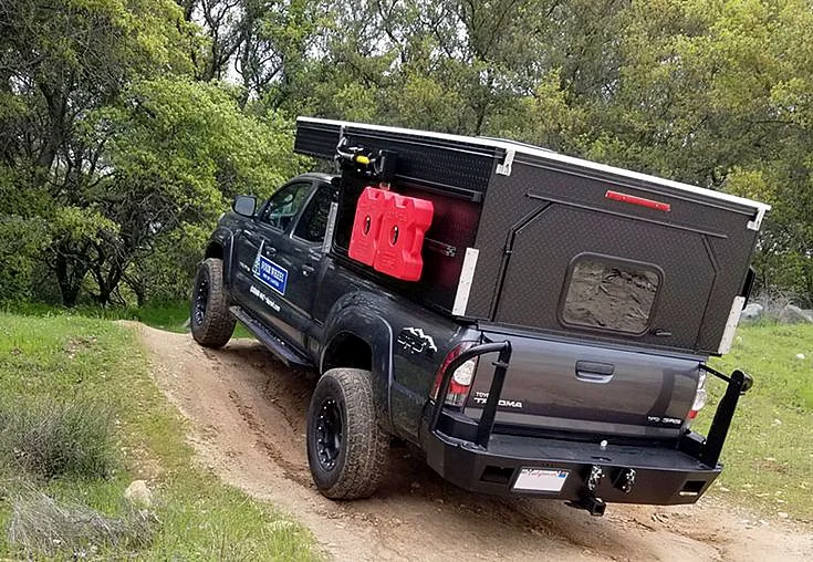 Fourwheel Project M kitted Tacoma driving off-road 