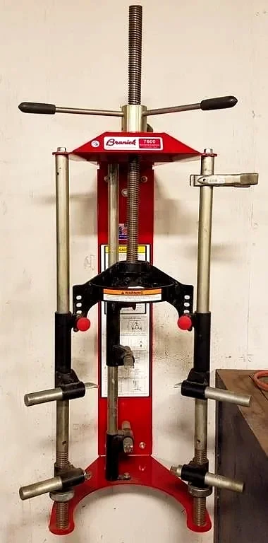 Branick 7600 wall-mounted coil spring compressor