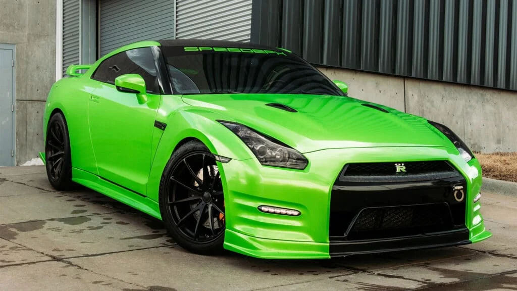 Neon Green Nissan R35 GT-R with black rims and tinted windows