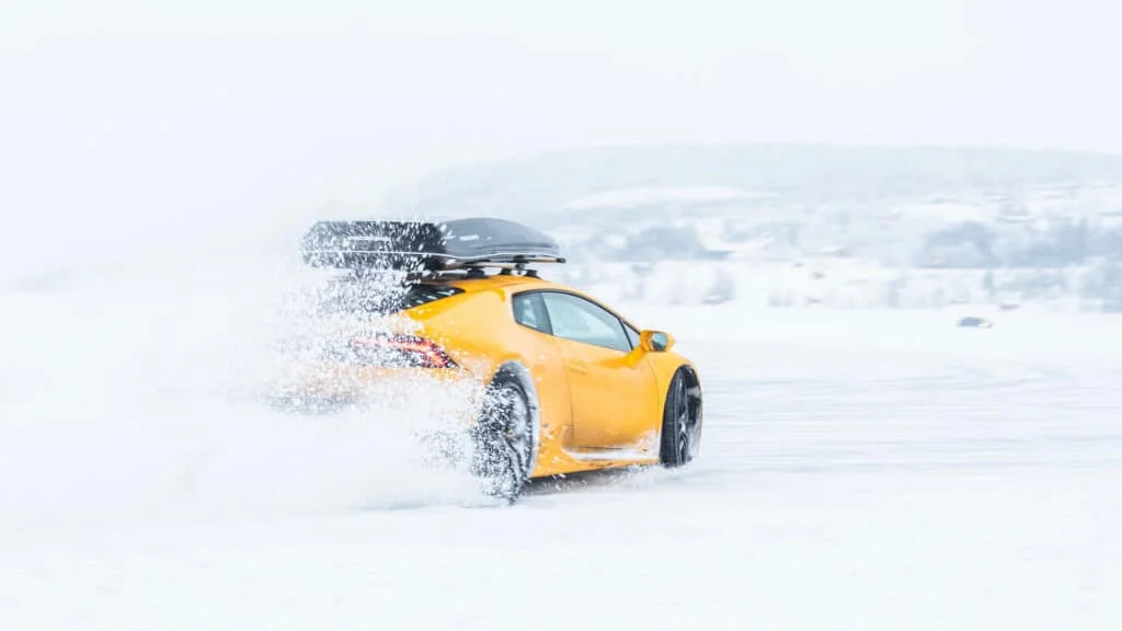 Yellow Lamborghini Aventador in the snow