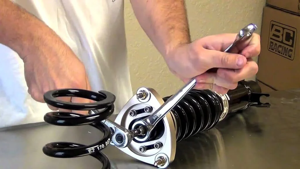 Coilover disassembly in process