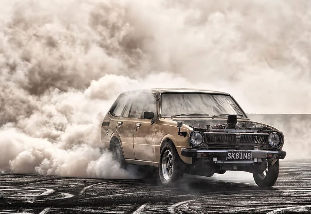 Car with loads of power burning rubber
