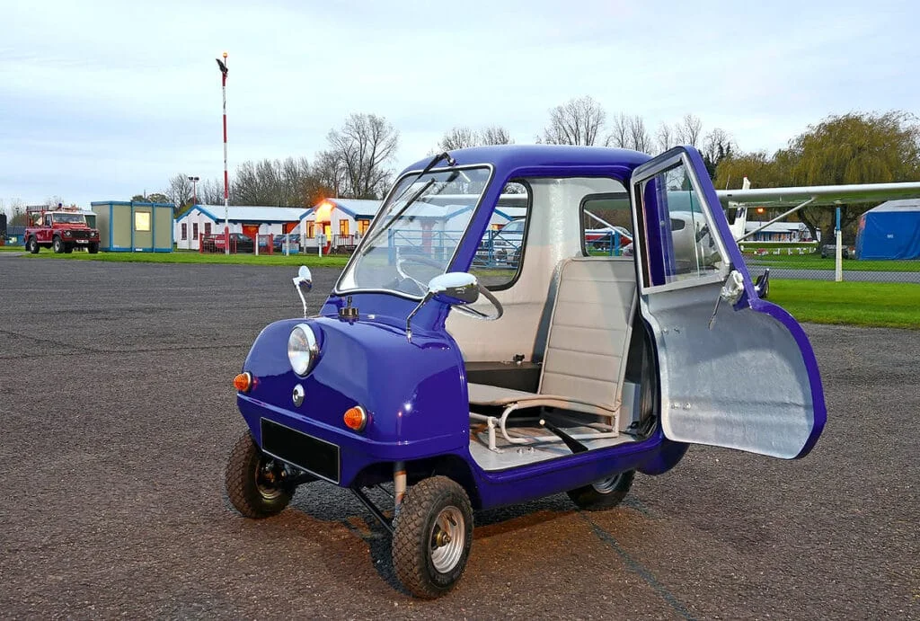 Smallest car in the world, P50 in blue with door open