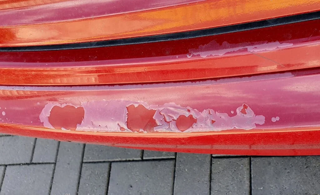 Peeling clear coat with spots