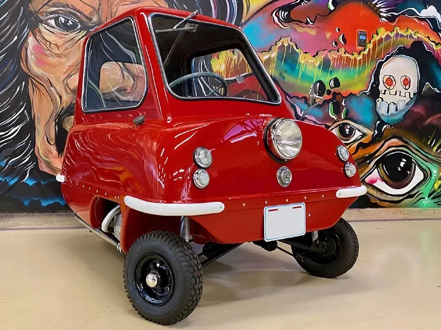 Red Peel P50 with a graffiti backrop