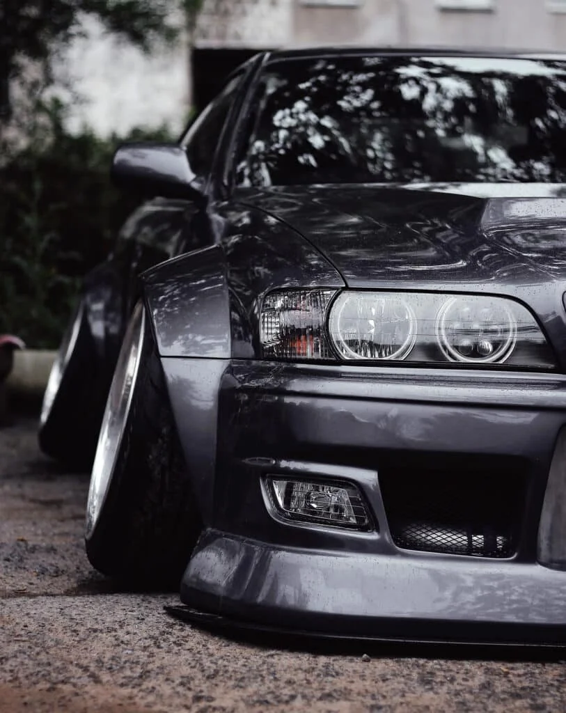 Grey BMW with excessive camber